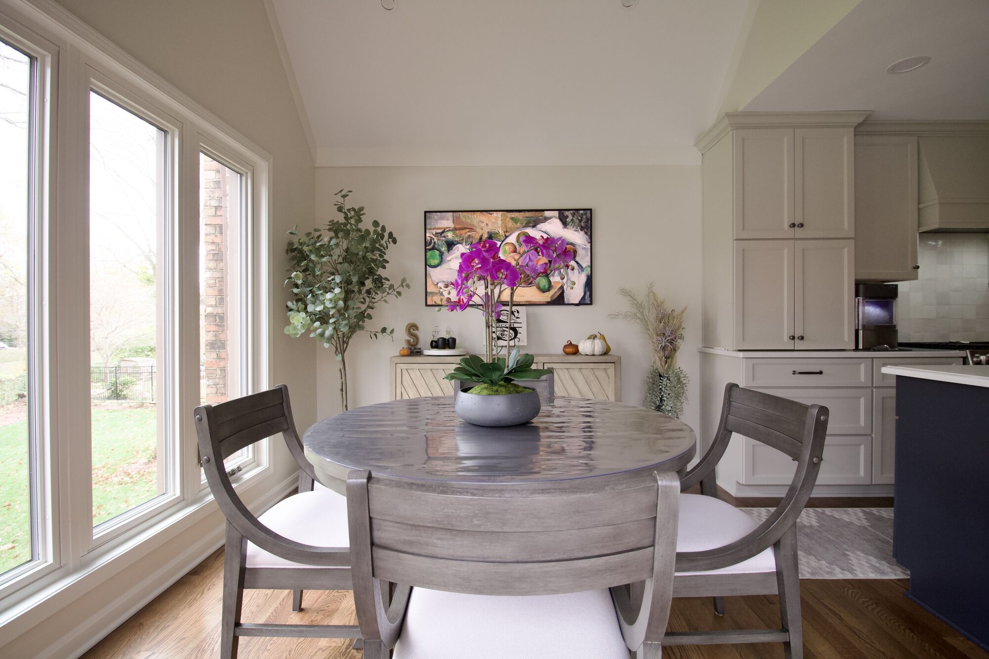 Custom dining area in Louisville, KY with natural light and orchid centerpiece by Trade Works Remodeling Custom dining area in Louisville, KY with natural light and orchid centerpiece by Trade Works Remodeling