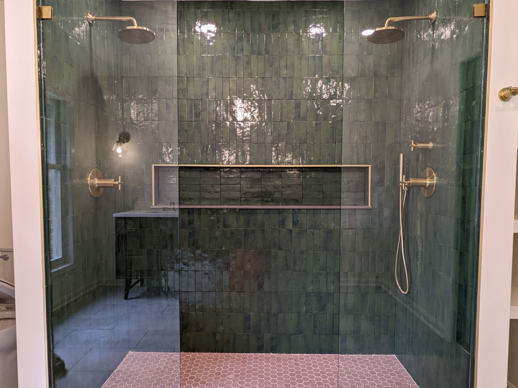 Green Tiled Shower with Double Heads and Glass Doors in Bathroom Renovation by Trade Works Remodeling in Louisville Green Tiled Shower with Double Heads and Glass Doors in Bathroom Renovation by Trade Works Remodeling in Louisville