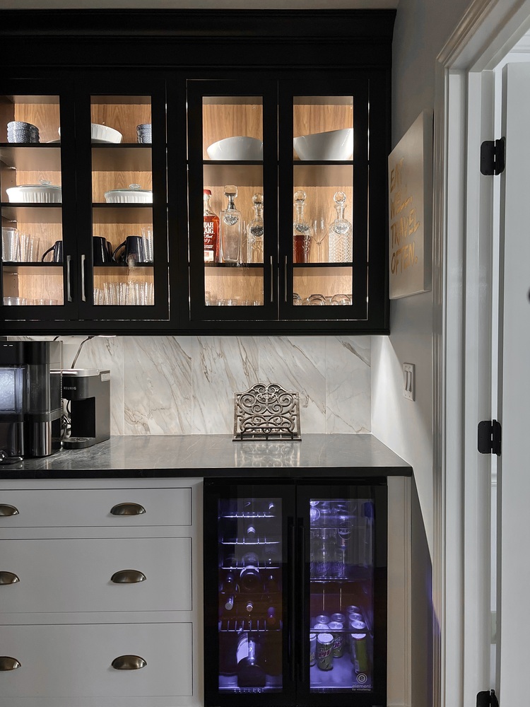 Built-in bar and glass cabinet storage in Indian Hills, KY custom kitchen by Trade Works Remodeling