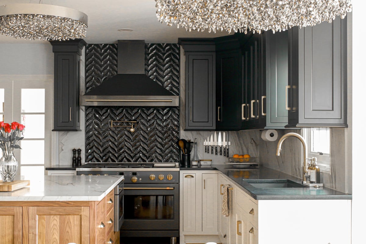 Close-up of luxury kitchen backsplash and range hood in Indian Hills, KY by Trade Works Remodeling