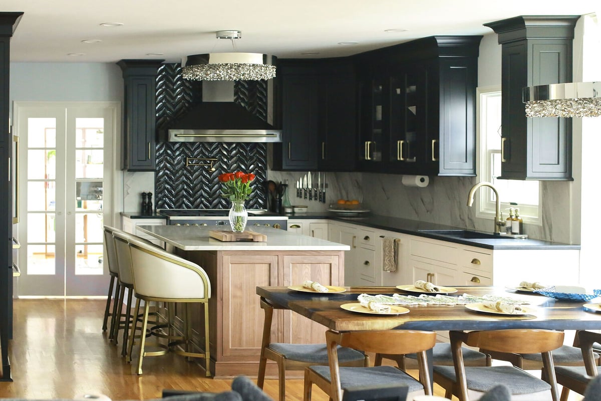 Custom kitchen remodel with black cabinetry and marble accents in Prospect, KY by Trade Works Remodeling