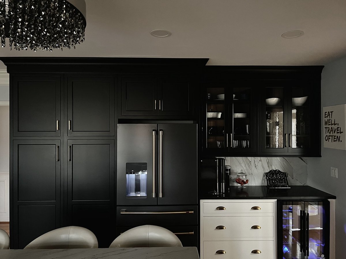 Luxury kitchen cabinetry with black and white contrast in Douglass Hills, KY by Trade Works Remodeling