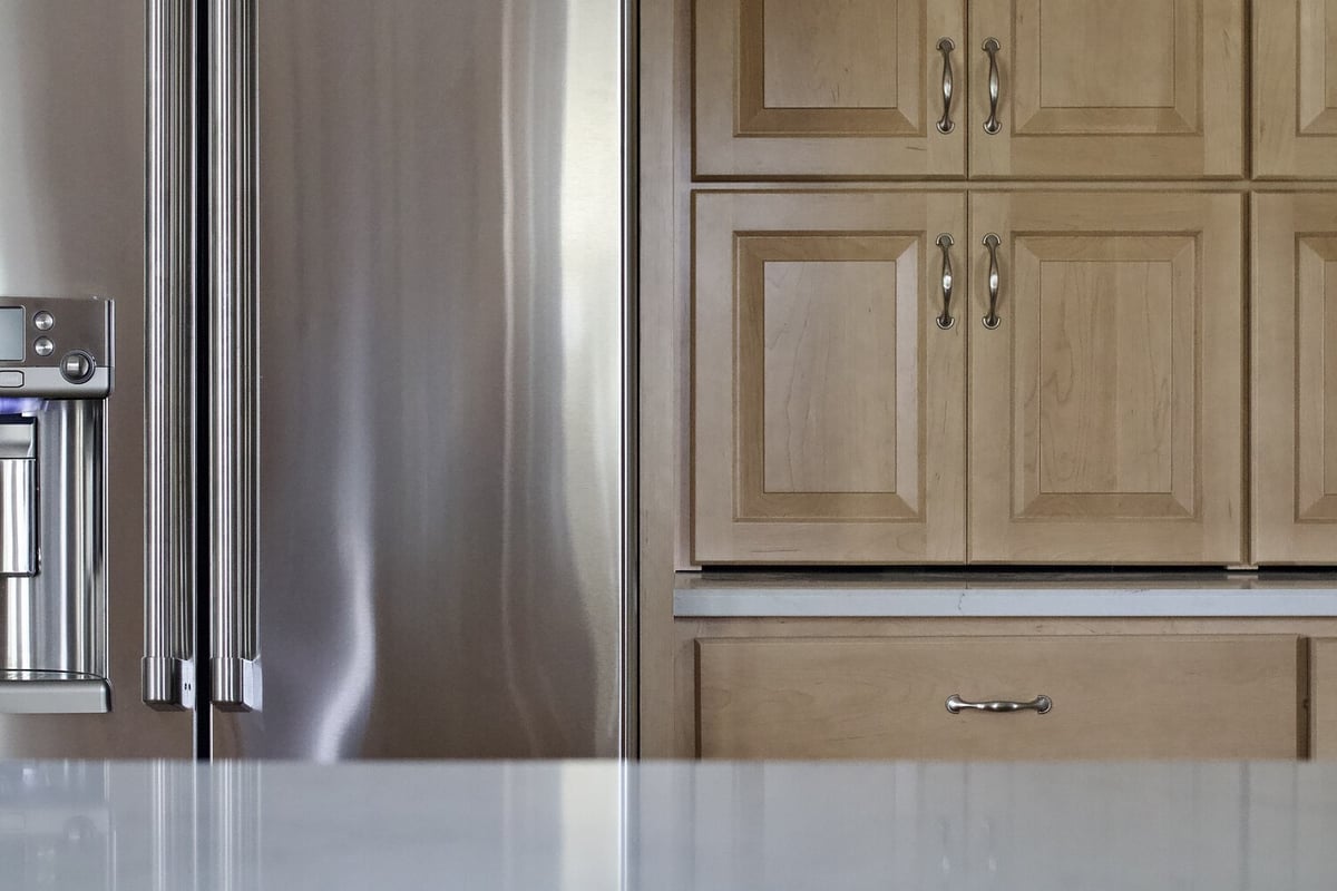 Close-up of luxury kitchen appliances and built-in storage by Trade Works Remodeling in Prospect, KY