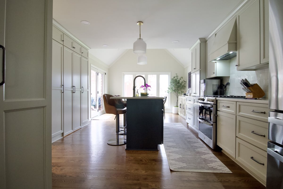Bancroft custom home kitchen with island and pendant lighting by Trade Works Remodeling
