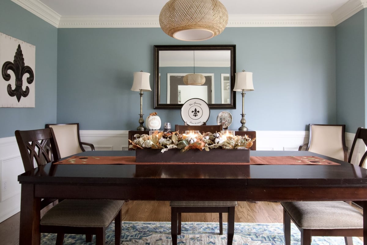 Formal dining room remodel with crown molding and blue accent wall by Trade Works Remodeling in Prospect, KY