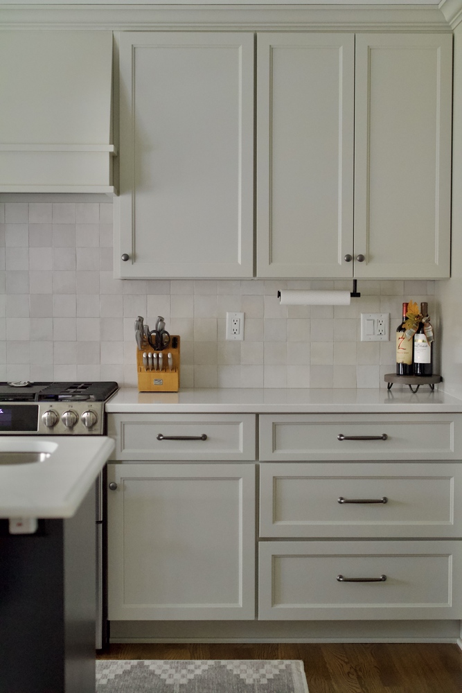 Kitchen cabinetry detail with wine storage and knife block in Anchorage, KY by Trade Works Remodeling