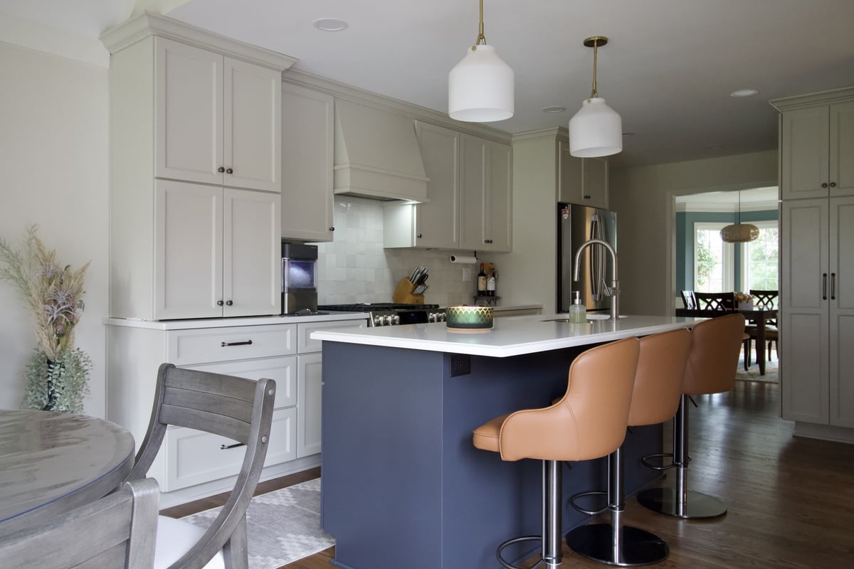 Kitchen remodel with island seating and modern lighting in Blue Ridge Manor, KY by Trade Works Remodeling