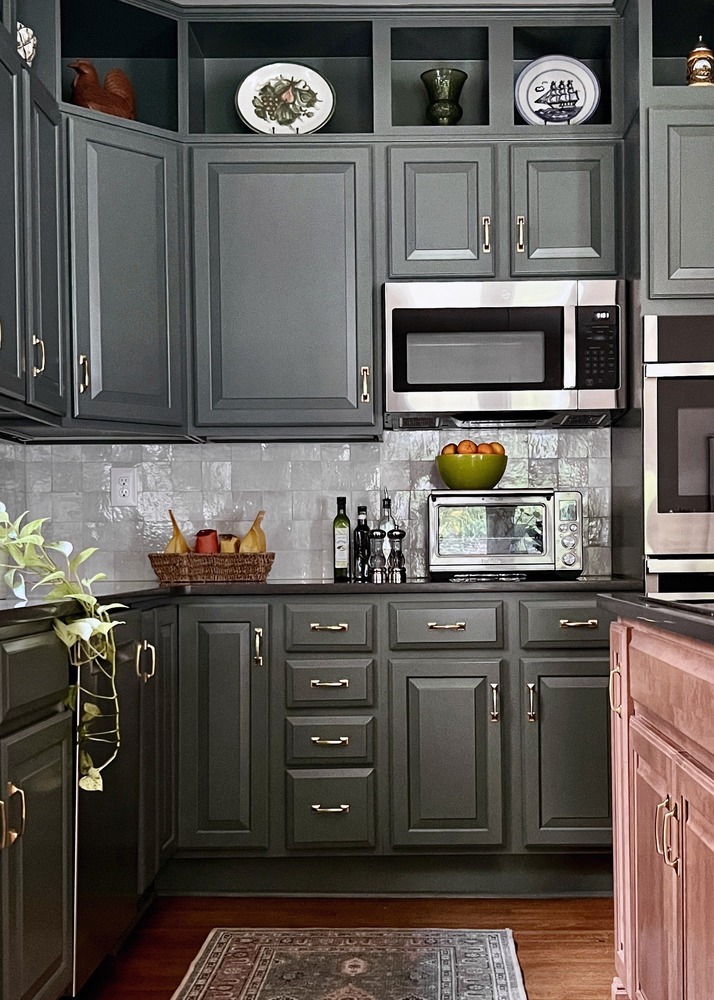 Custom kitchen remodel with green cabinets and stainless appliances in Louisville, KY by Trade Works Remodeling