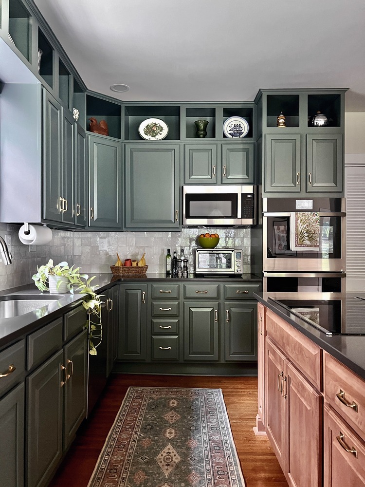 Custom kitchen with green cabinetry and warm wood island by Trade Works Remodeling in Rolling Hills, KY