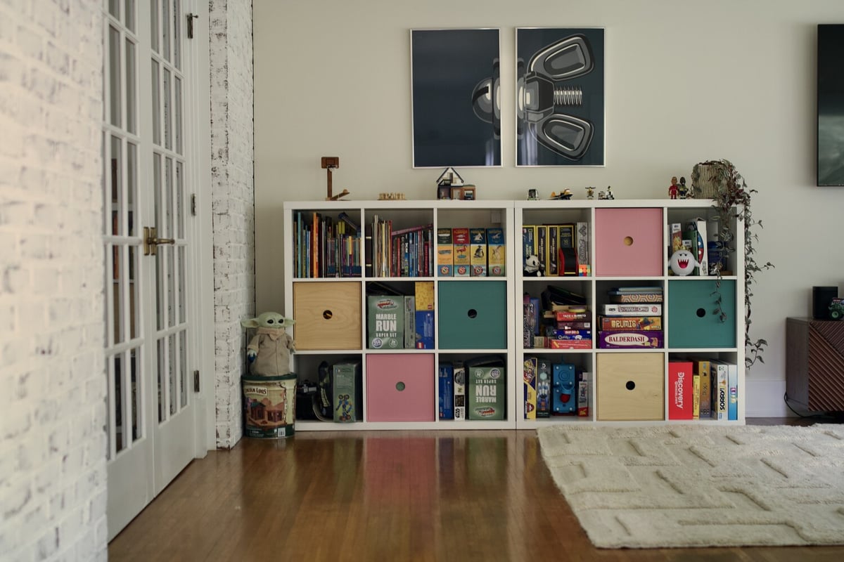 Toy and book storage in custom living area remodel by Trade Works Remodeling, Highlands, KY