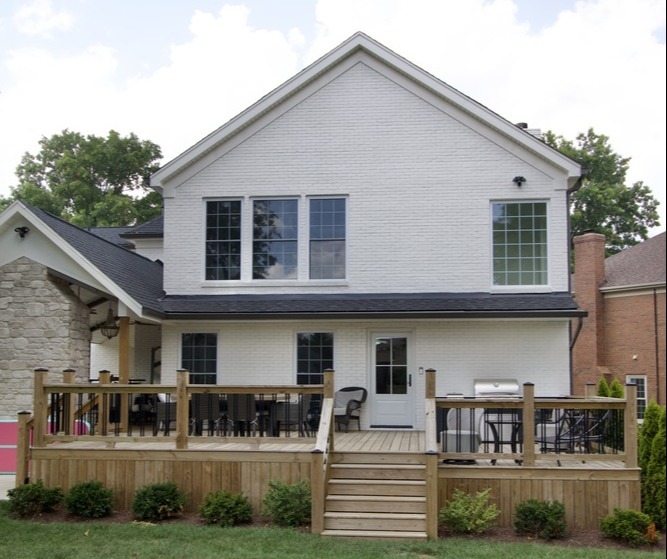 Rear home addition with custom-built deck and steps by Trade Works Remodeling in Owl Creek, Kentucky