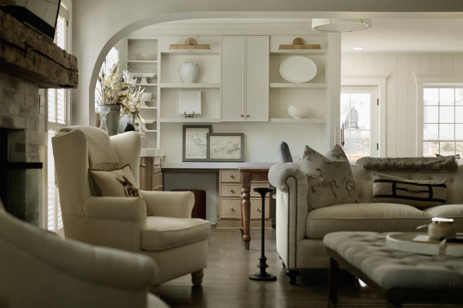 Cozy living room remodel with built-in shelving by Trade Works Remodeling in Owl Creek, KY