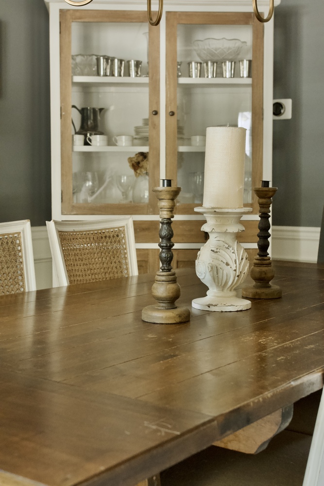 Custom dining space featuring decorative candlesticks and cabinet storage by Trade Works Remodeling in Lyndon, KY
