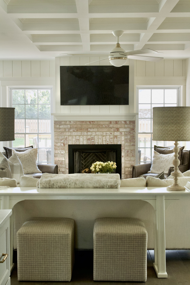 Elegant remodeled living room with modern fireplace by Trade Works Remodeling in St. Matthews, KY
