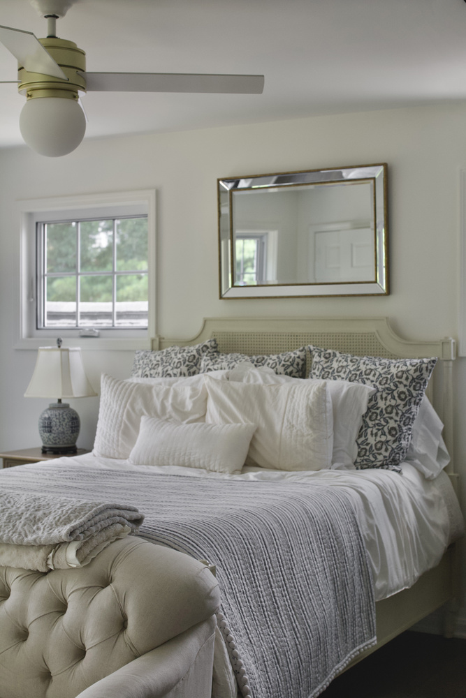 Master bedroom remodel with ceiling fan and upholstered furniture by Trade Works Remodeling in Anchorage, KY