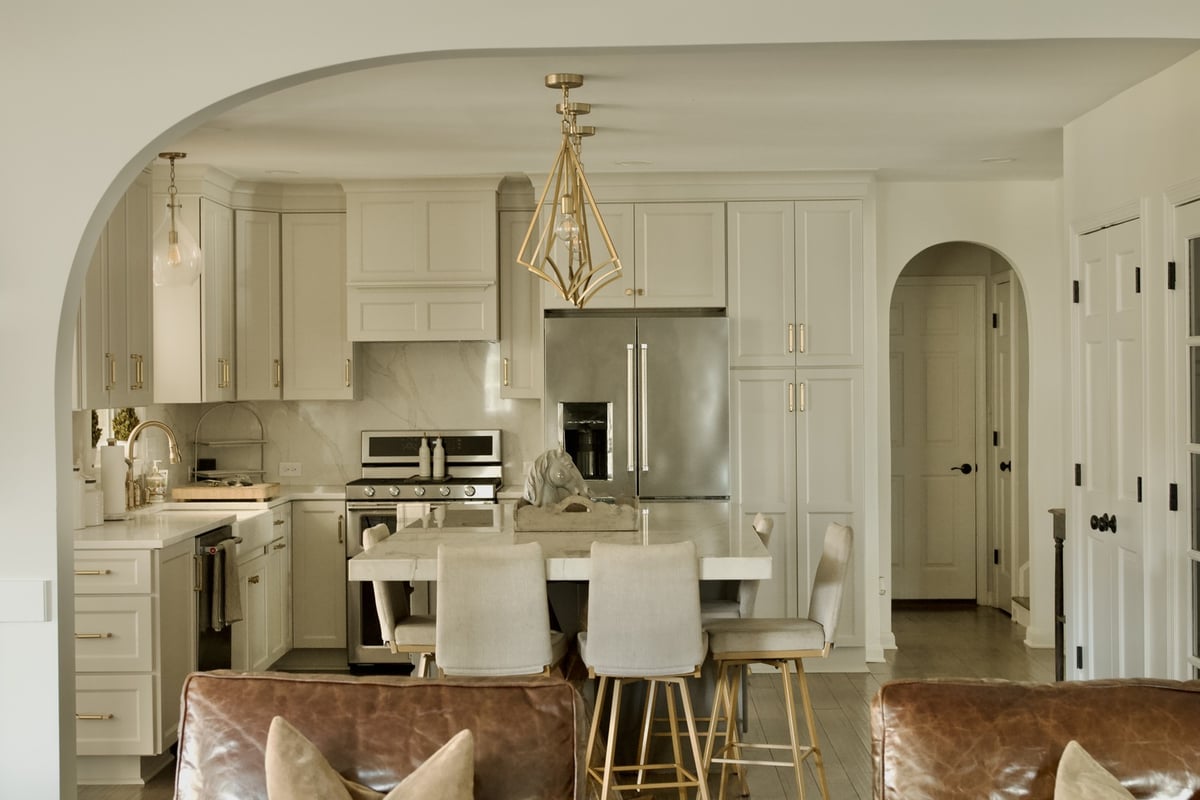 Modern kitchen remodel with island and pendant lights by Trade Works Remodeling in Louisville, KY