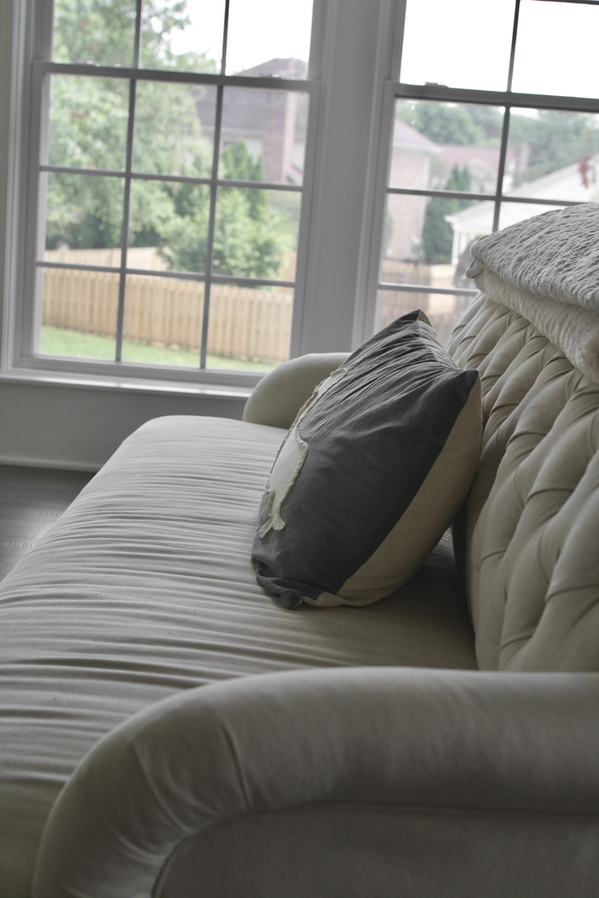 Modern living space with natural light and cozy furnishings by Trade Works Remodeling in Douglass Hills, KY