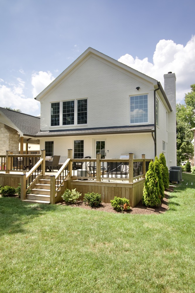 Outdoor living space and backyard renovation by Trade Works Remodeling in a Louisville custom home
