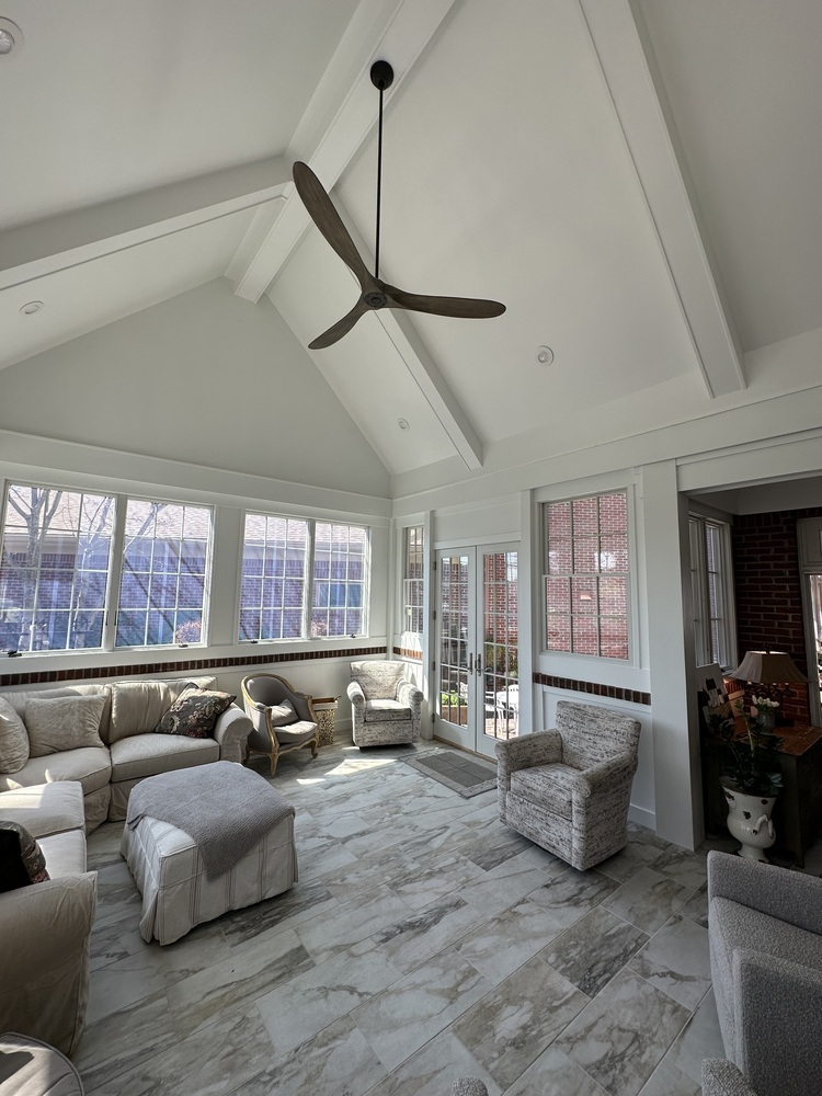 Custom sunroom with vaulted ceiling and fan by Trade Works Remodeling in Greymoor, KY