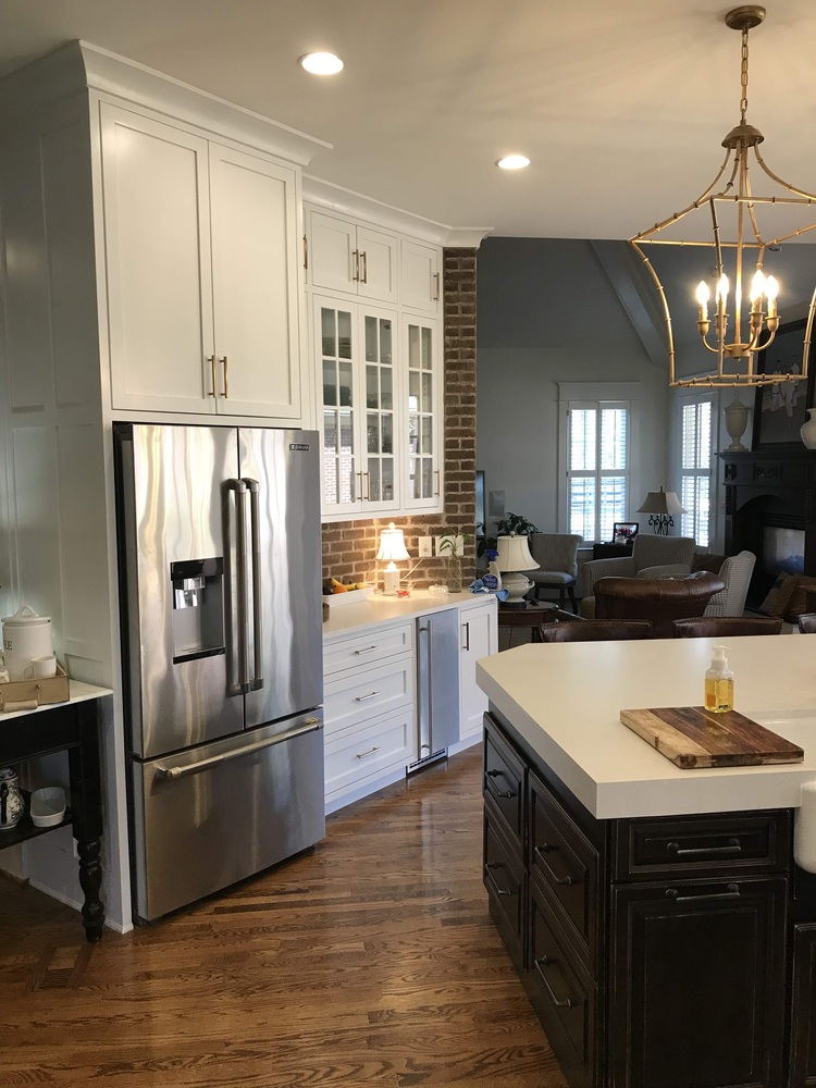 Renovated kitchen space with custom cabinetry and stainless steel appliances by Trade Works Remodeling in Norwood, KY