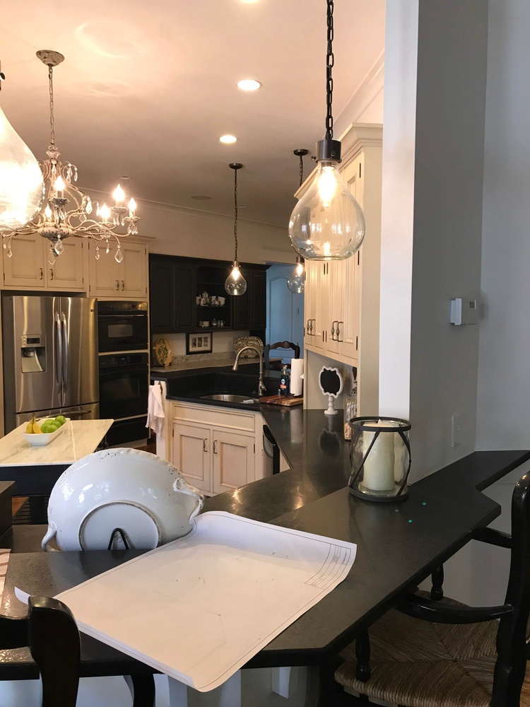 Trade Works Remodeling custom kitchen renovation with black countertops in Prospect, KY