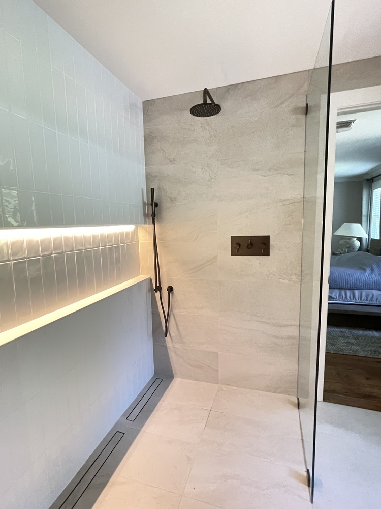 Luxury walk-in shower remodel with rainfall showerhead by Trade Works Remodeling in Louisville, KY
