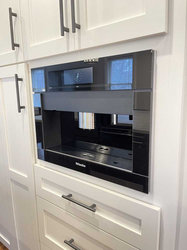 Custom home kitchen remodel featuring built-in Miele coffee maker in Louisville, KY by Trade Works Remodeling