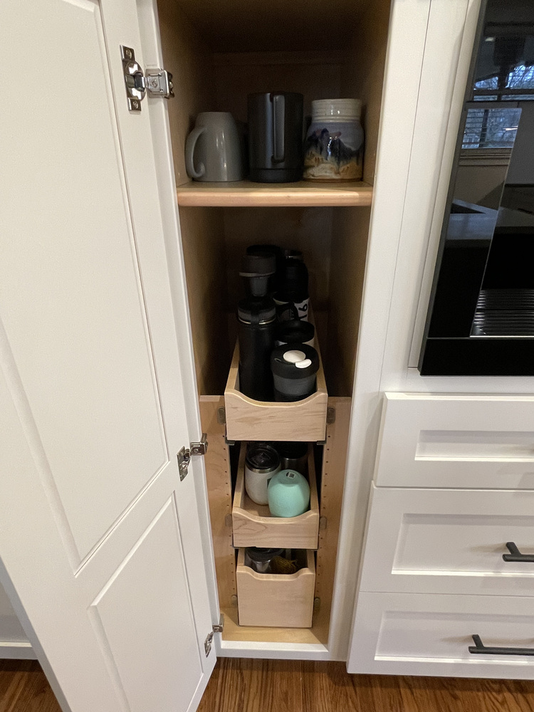 Custom kitchen storage cabinet remodel with pull-out shelving in Old Brownsboro Place, KY by Trade Works Remodeling