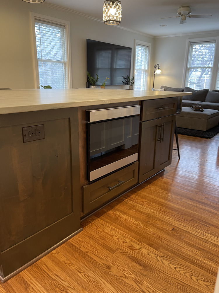 Kitchen island renovation featuring stainless steel microwave in Rolling Hills, KY by Trade Works Remodeling