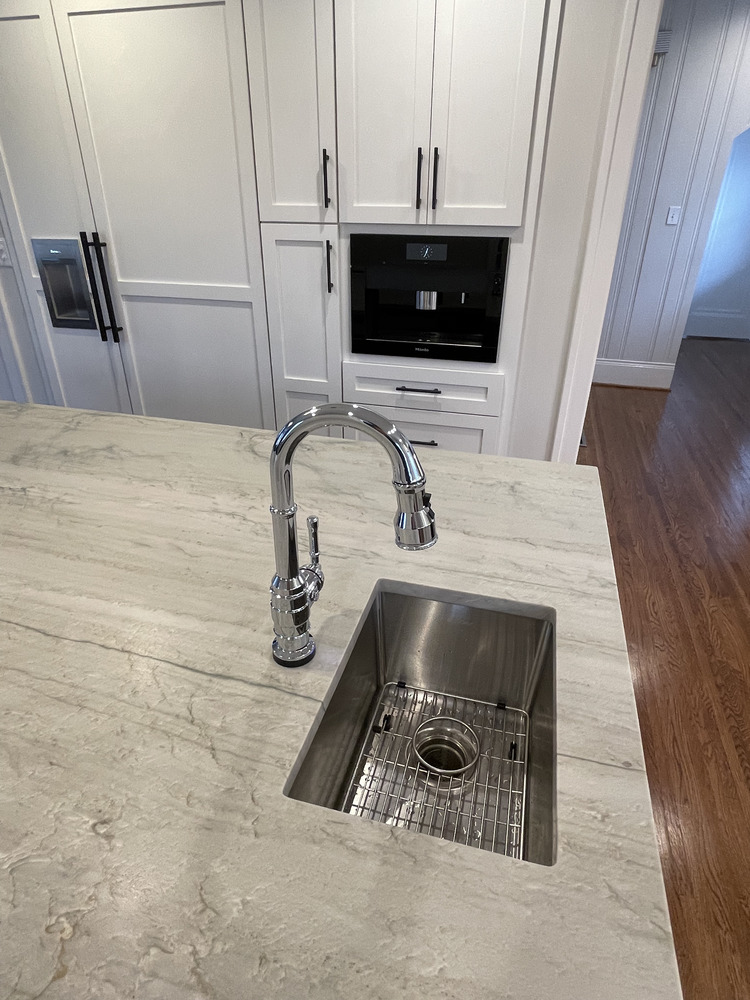 Kitchen island upgrade featuring modern sink design in Anchorage, KY by Trade Works Remodeling Kitchen island upgrade featuring modern sink design in Anchorage, KY by Trade Works Remodeling