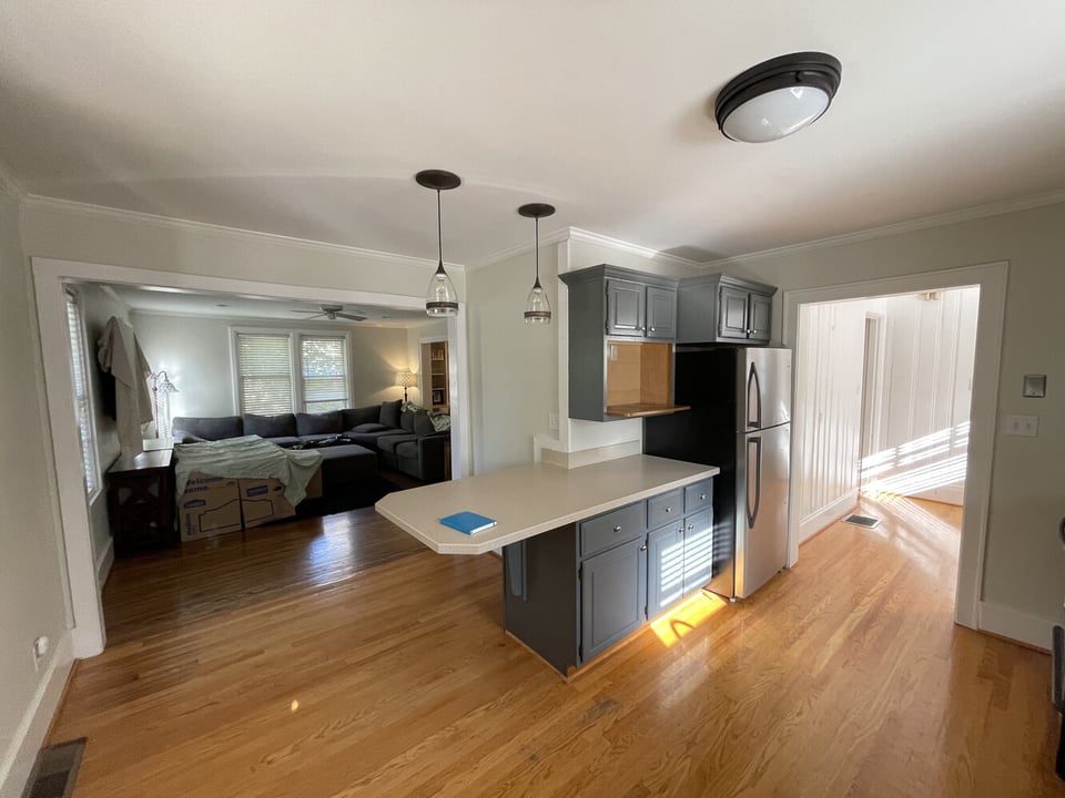 Kitchen remodel with bar seating and updated layout in St. Matthews, KY by Trade Works Remodeling