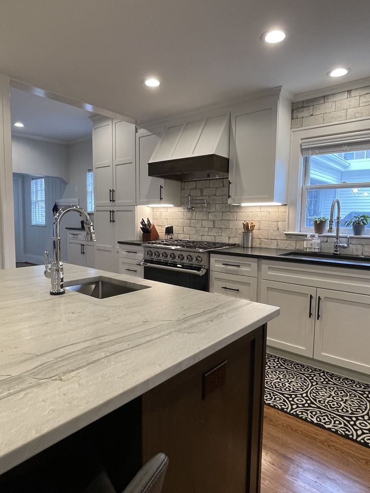 Louisville custom kitchen upgrade with stone countertops and white cabinetry by Trade Works Remodeling