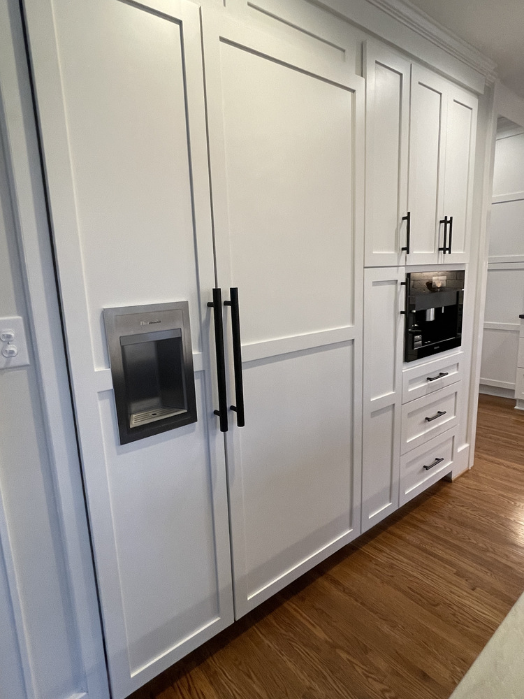 Updated cabinetry design with black hardware in Indian Hills, KY by Trade Works Remodeling