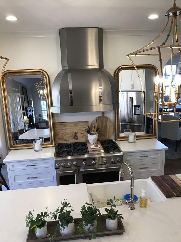 Stainless steel range with custom cabinetry by Trade Works Remodeling in Louisville, KY