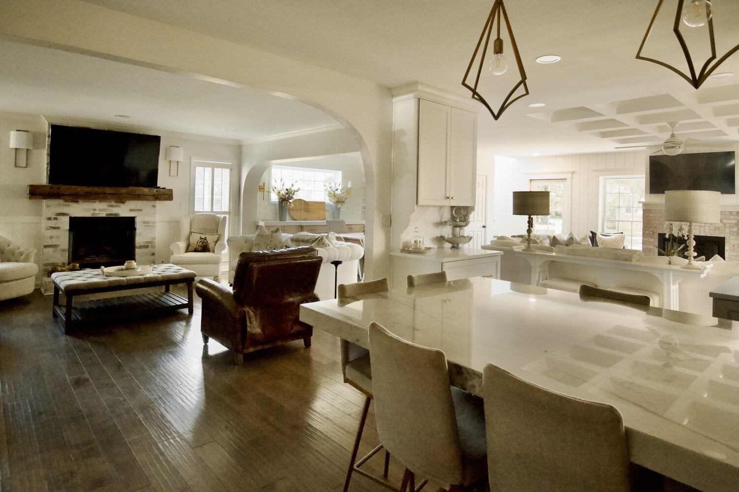 Spacious custom living and kitchen space with natural light and coffered ceilings in Louisville, KY by Trade Works Remodeling Spacious custom living and kitchen space with natural light and coffered ceilings in Louisville, KY by Trade Works Remodeling