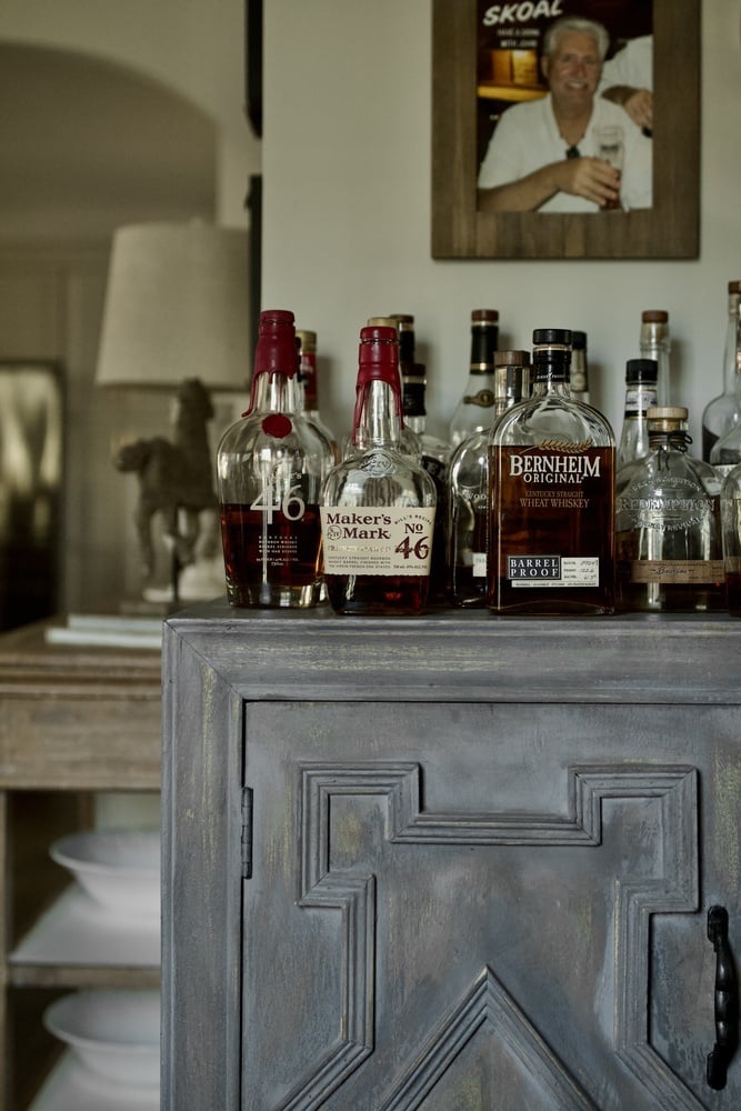 Whiskey bar with Kentucky bourbon collection by Trade Works Remodeling in Prospect, KY